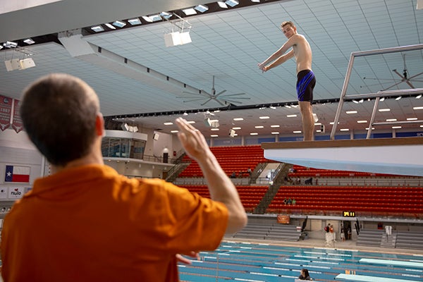 Don Crowley instructs a student on safe diving