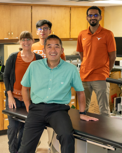 Hirofumi Tanaka with three of his students in the Cardiovascular Research Lab