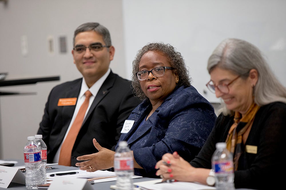 Photo of Victor Saenz, Joanne Smith, and Trish Roberts-Miller