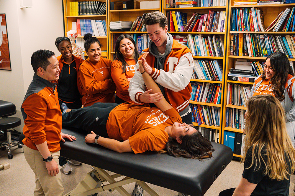 Students practice the athletic training techniques they have learned.