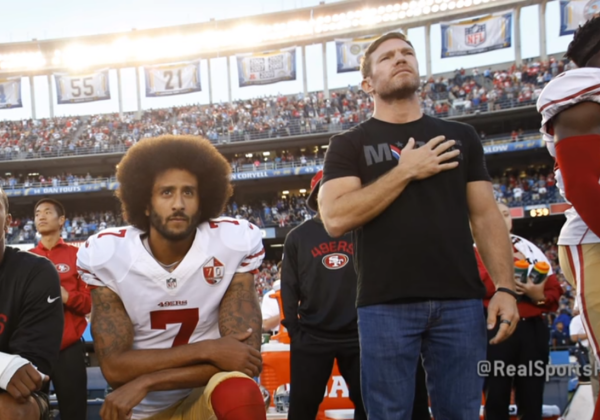 Nate Boyer and Colin Kaepernick during the national anthem