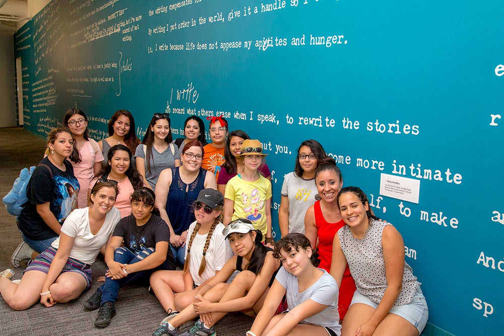 Tracey Flores with workshop participants and graduate students