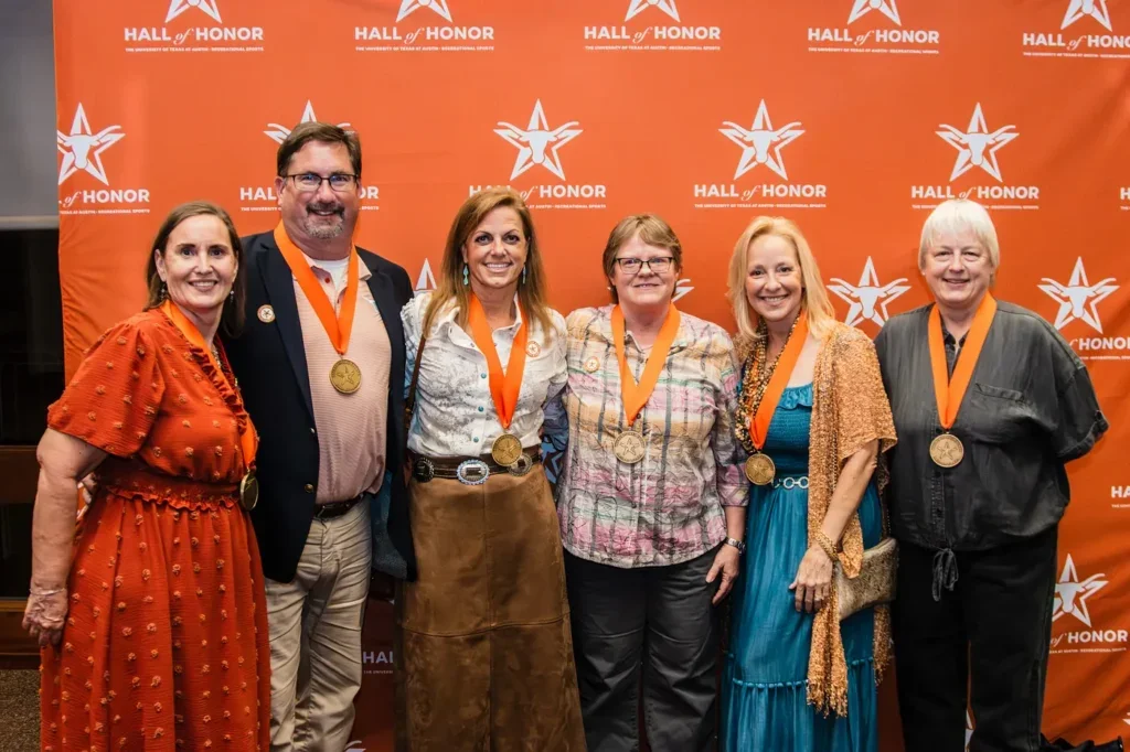 Tara Brady (far right) and her fellow Inaugural Building Coordinators were inducted into the 2025 UT RecSports Hall of Honor. 