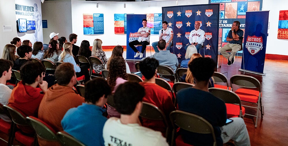 Members of the Houston Astros speak at the Stark Center.