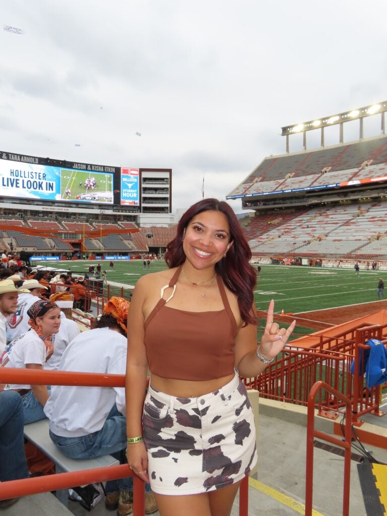 Destiny Arambula at the  Darrell K Royal–Texas Memorial Stadium.