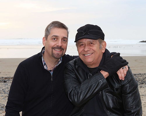 Dean Charles R. Martinez, Jr., with his father.