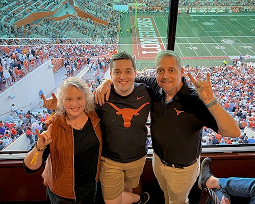 Dean Martinez with his wife, Leslie, and son, Andrew.