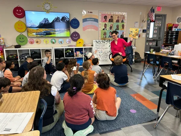 Chavez reads Dr. Seuss to UT Elementary students.