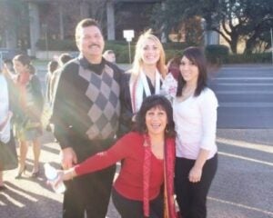 April Willis with her family at Commencement