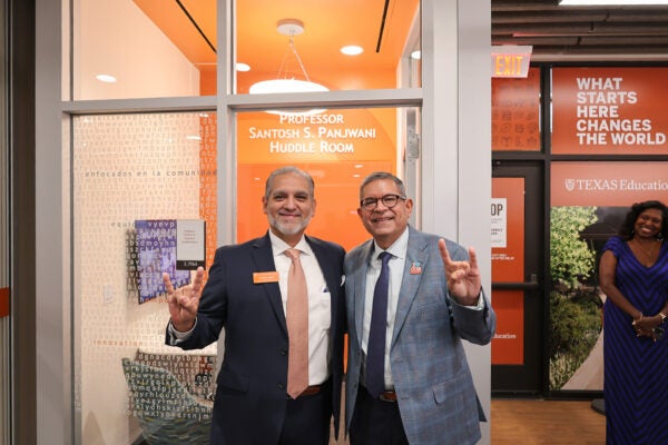 Manny Panjwani with associate dean Victor Sáenz.